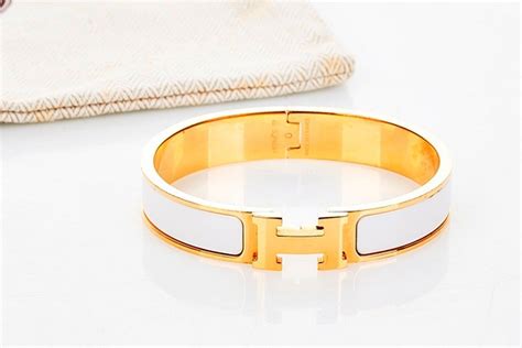 hermes white and gold bracelet|Hermes enamel bracelet white.